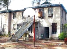 abandoned jail back MAA Old jail recreation yard, early 2000's.